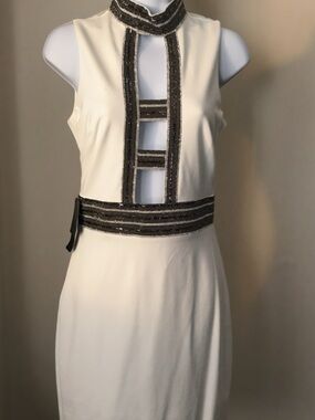 BEBE Sleeveless White mini Dress with sequin Trim Accent